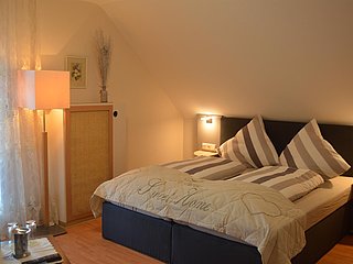 Zimmer mit Balkon